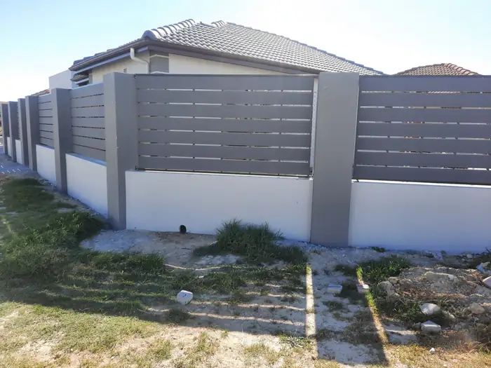 The boundary screen turning the corner of the property
