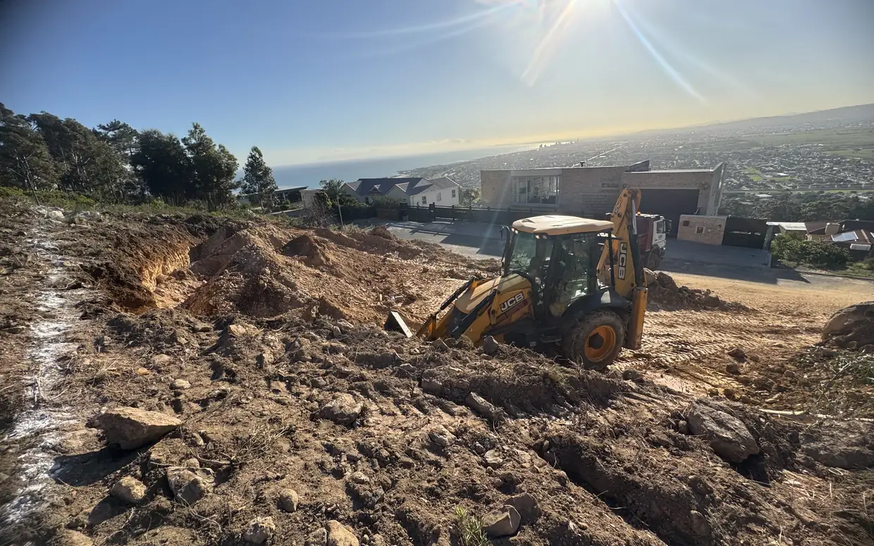 House van der Westhuizen: the TLB cutting into the slope
